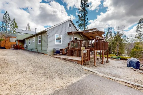 Remodeled partial lake-view home with dock, beach & boat trailer parking