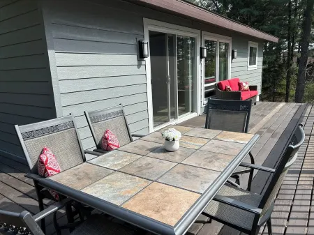 Castle Rock Lakefront Home, with pier, sand bottom, and wrap around deck