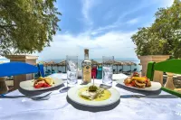 Sun Hotel Kineta Beach Front - parking