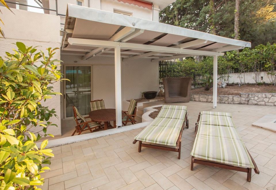 Hotel AH Premium Baia dei Faraglioni, Exterior, Garden