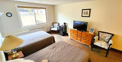 The Medicine Hat Villa Отели рядом с достопримечательностью «Колледж Медисин-Хат»