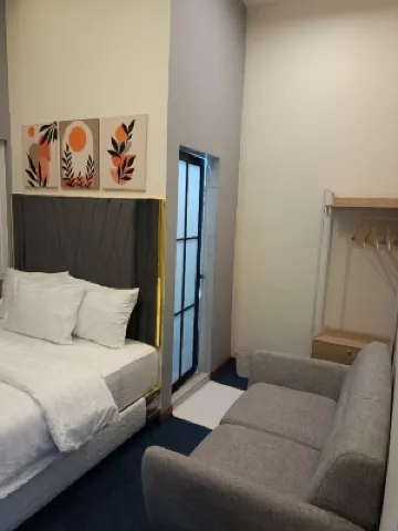 22 m² dengan 1 kamar tidur dan 1 kamar mandi pribadi di Medan Perjuangan Hotel dekat Universitas Negeri Medan