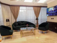 Cairo Taj Mohandessn Hotels & Suites Отели рядом с достопримечательностью «Докки»