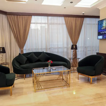 Cairo Taj Mohandessn Hotels & Suites Отели рядом с достопримечательностью «Докки»