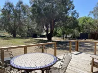Vintage wood paneled travel trailer on Kernville Ranch with horses and hot tub Hotels in Kernville