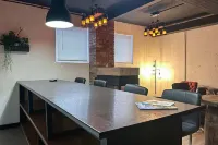 Charming Prohibition-Era Speakeasy Lounge with Bedroom and Commercial Kitchen