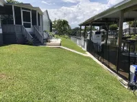 Waterfront, indoor pool, covered marina, fenced 3/2 home