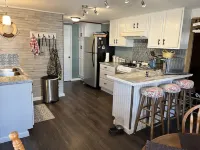 Cozy, private, rustic-modern cabin, a doorway to fine fishing and lake fun!