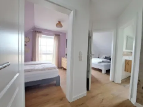 Geräumige Ferienwohnung mit 2 Schlafzimmern, 2 Bädern und Garten Hotels in Walsrode