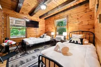 Riverfront Cabin with Cedar Wood Hot Tub, Dry Sauna, and Dock