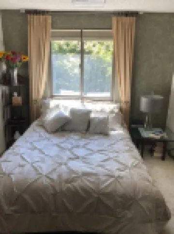 Elegant Townhome, park-like setting. Local event transportation provided.