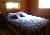 Island Getaway! Nestled in the woods with easy access to sandy beach