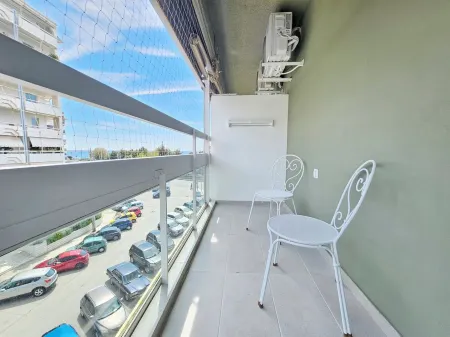 Charming studio on the sea in lovely Paleo Faliro with AC, WiFi