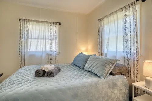 Charming Green Cabin with Private Round Lake Access, Minutes from Ludington