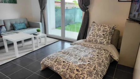 Loue à Lanton Appartement RDC Terrasse, T2, 3 Couchages