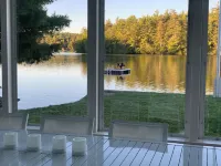Stunning lakefront home with a boathouse, private dock, firepit and lake views Hotels in Wakefield