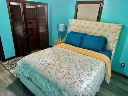 House dwelling that combines The bedroom kitchen and living area into one space