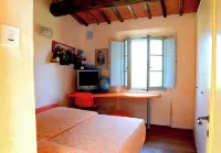 Tuscan village in SIena. farmhouse surrounded by garden,pool and panoramic view