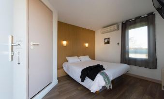 Brit Hotel Essentiel Pau Lescar - Housity