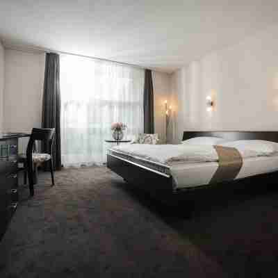 Grand Hotel les Endroits Rooms