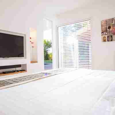 Villa d'architecte avec piscine et jacuzzi privés Rooms