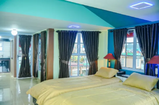 Sunset Curly Bay Hotel & Resort Hotels near 500 Lohan Temple