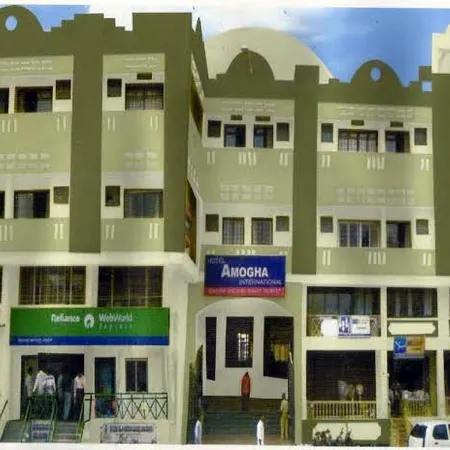 Amogha International Hotel Отели в г. Читрадурга