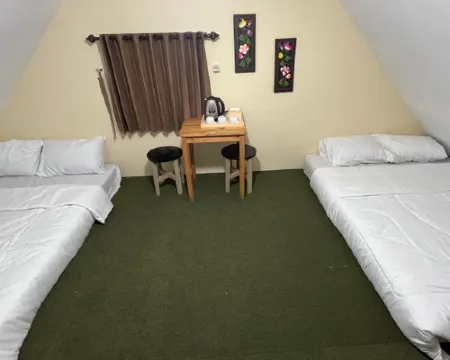 Villa Kolah Watu โรงแรมในโวโนโซโบ