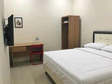 The Galton Hotel Отели в г. Wolio