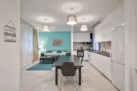 Large apartment between beach and city- With parking and private beach.