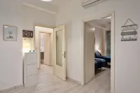 Large apartment between beach and city- With parking and private beach.