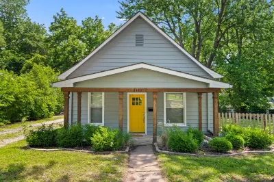 Stylish West Plaza Retreat w/ Huge Yard, BBQ, and Games Hotels near Fine Stitch LLC