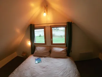 YOUR CALM AND COZY CHALET 200 M FROM THE BEACH Hotels near Juno Beach