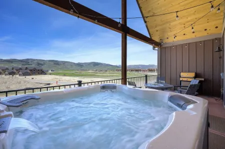 Upscale, spacious Granby home w/ stunning mountain views, hot tub from deck!