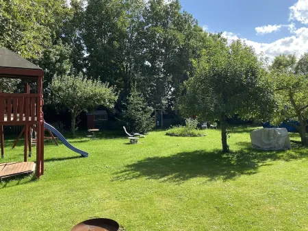 Vacation apartment "Seestern" with large garden in the heart of Pilsum