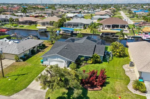 Gulf access pet friendly waterfront oasis with NEW heated salt water pool & spa