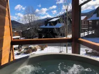 Relax & Recharge: Cozy Cabin with Hot Tub & Mountain Views