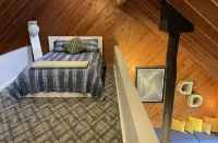 Mid-century A-frame style cabin with lake views near the heart of Amish Country