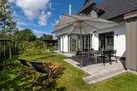 Exclusive Apartment in Central Location with Garden, Fireplace, Wlan, PS5, Fifa25, Karaoke