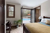 Private lakeside retreat with pool, hot tub, and sauna