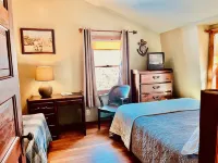Your Dream Getaway 220’ Waterfront Beach House Rock River WI FP Pool Pier Kayaks