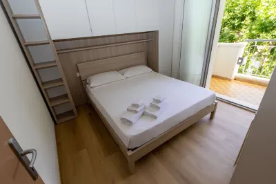 DimmiDiRimini - Appartamenti in Affitto Hôtels à proximité de la Rimini Miramare