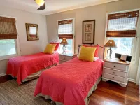 Charming Island Escape with Screened Porches and Spacious Yard - Inviting Retreat