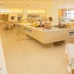 薩賓娜海灘飯店 - 早餐