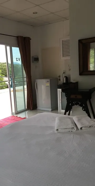 ห้องพักมาตรฐานเตียงใหญ่พร้อมเตียงใหญ่