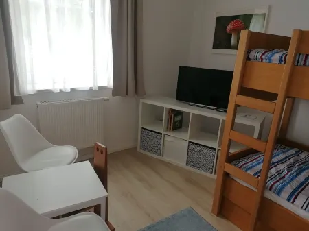 First floor apartment by the water with terrace, carport parking space and WLAN Отели в г. Грайфсвальд