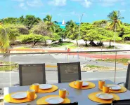 Gorgeous Eagle Beach 4-bedroom Condo with surround balcony and fitness room