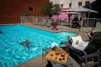Logis Hôtel Grand Hôtel d'Orléans Rest. le Goulu - piscine