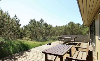 Charming Holiday Home in Blåvand with Hot Tub