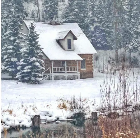 Lena's Cabin in Vail is nestled right beside Gore Creek,  minutes from skiing.